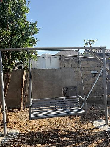 saxta baba satisi: Həyətdə istifadə edilmiş yelləncək satılır. Metal konstruksiyası saz — 2