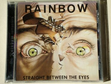 Knjige, časopisi, CD i DVD: Rainbow - Straight Between The Eyes Originalno izdanje sa bukletom na