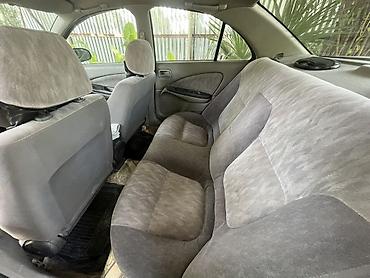 ford avtomobilleri: Nissan Sunny: 1.6 l | 2002 il Sedan — 6