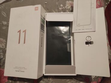 телефон fly 554: Xiaomi Mi 11, 256 GB, rəng - Gümüşü, 
 Barmaq izi, Simsiz şarj, İki sim kartlı