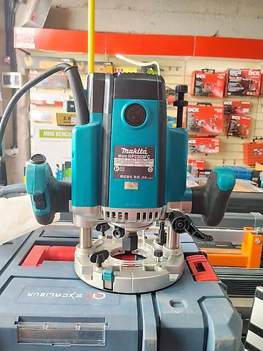 фрейзер макита: Фрезер погружной Makita RP2303FC (220–230 В, 2000 Вт) Ключевые — 1