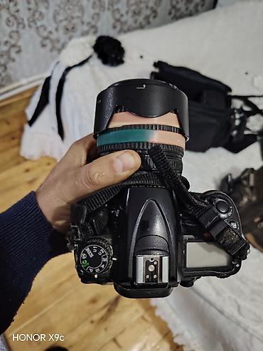 nikon d300: Nikon d7000 — 1