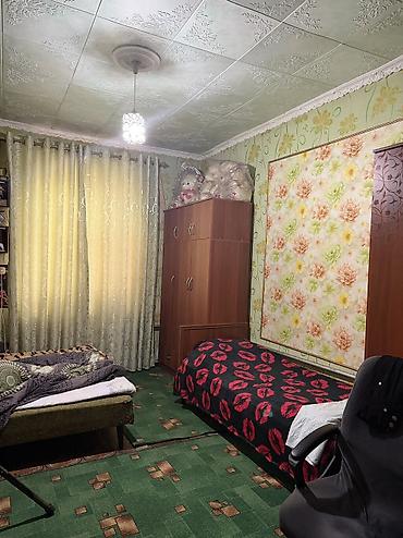 Продажа полдома: Продаю 2х комнатный дом барачного типа в Кызыл-Аскере,по улице — 2