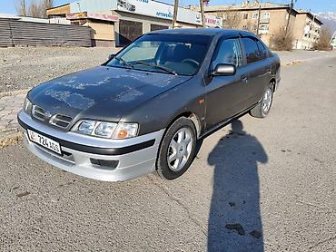 Другие детали салона: Салон автомобиля с правым рулём, тканевые сиденья с накидками и — 2