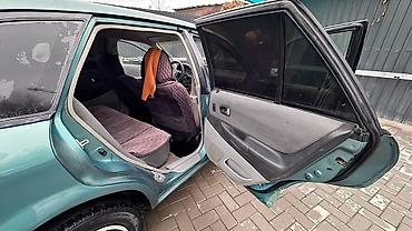 Mazda: Mazda 323: 2003 г., 1.6 л, Автомат, Бензин, Универсал — 1