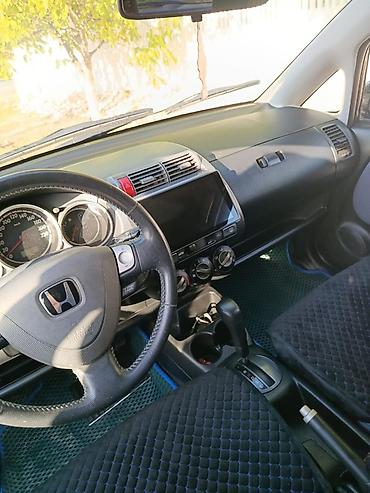 мото номер: Honda Fit: 2002 г., 1.4 л, Автомат, Бензин, Хэтчбэк — 3