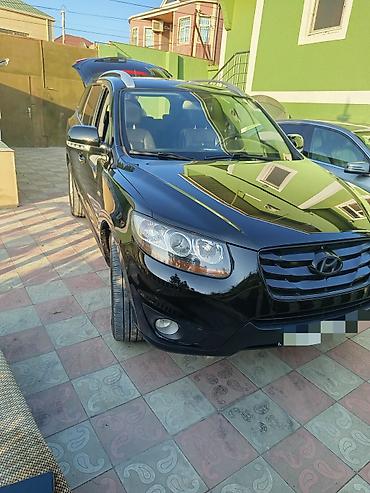 opel duman: Hyundai Santa Fe: 2 l | 2010 il Krossover — 4