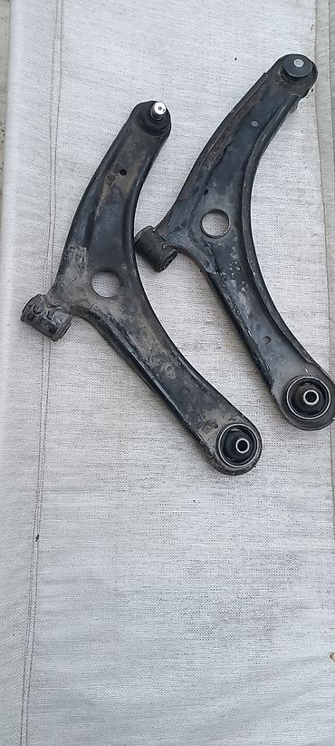 pires baglyan: Məhsul: Ön asma üçün alt qollar (sol və sağ cüt) Təsvir: - Metal — 2
