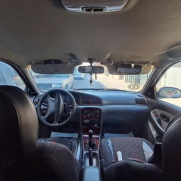 qəzali: Kia Clarus: 2 l | 1997 il Sedan — 9