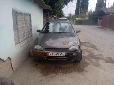 газ афто: Mazda 121: 1991 г., 1.5 л, Механика, Бензин, Седан