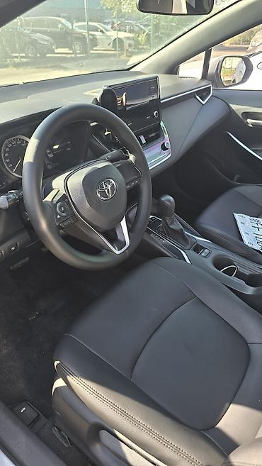 tayota karolla: Toyota Corolla: 2022 г., 1.8 л, Вариатор, Гибрид, Седан — 9