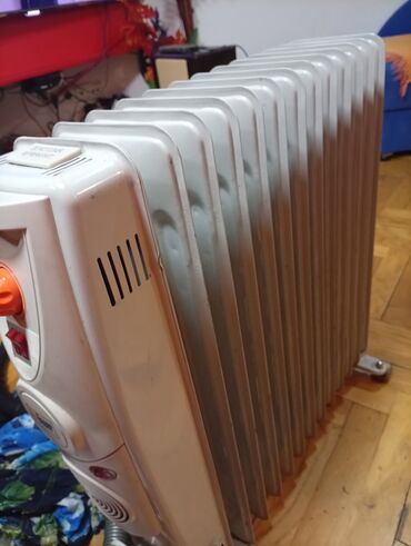 Uljani radijatori: Ulje­ni radijator na točkićima - Tip: električni uljni radijator sa — 2