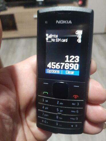 Nokia: Nokija x1 sa dve kartice kao nova radi na sve mreze,baterija — 2