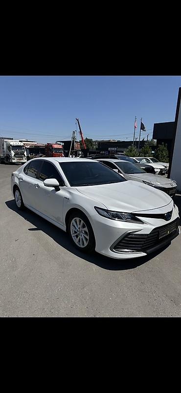corolla 2018: Toyota Camry: 2021 г., 2.5 л, Гибрид, Седан — 10