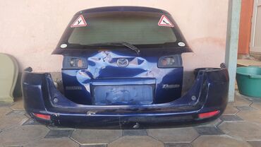продаю mazda: Задний Бампер Mazda 2002 г., Б/у, цвет - Синий