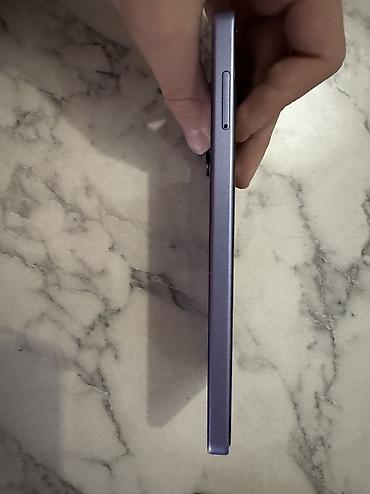 05: Xiaomi 256 GB, rəng - Bənövşəyi, 
 Barmaq izi, Face ID, Sensor — 9