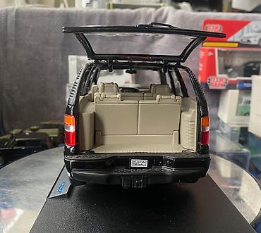 Avtomobil modelləri: Коллекционная модель GMC Yukon Denali black 2001 Welly Art  — 15