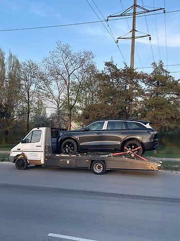 tow truck: Со сдвижной платформой — 1