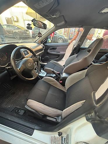 kovş: Subaru Impreza: 2 l | 2007 il 301000 km Sedan — 7