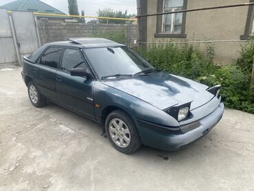 эшка 302 303: Mazda 323: 1995 г., 1.6 л, Механика, Бензин, Хетчбек