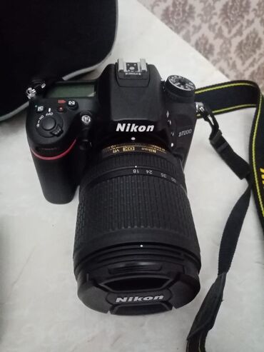 фотоаппарат никон полупрофессиональный: Satılır: Nikon D7200 DSLR Fotoaparat (18-140mm VR obyektivlə birlikdə)
