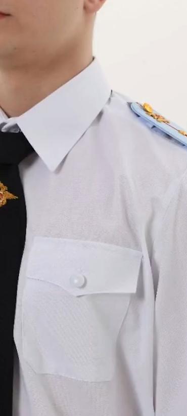 Рубашки: Белая форменная рубашка с длинным рукавом и накладными карманами с — 12