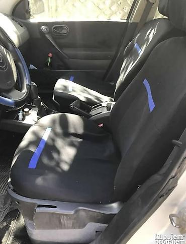 navigacija za auto cena: Megan mk2 2003 1.6 benzinac braon sto je na branicima je git da popuni — 9
