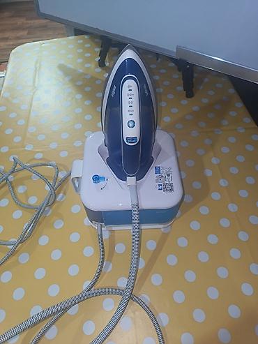 daş ütü: Braun buxarlı ütü sistemi – baza stansiyalı model Xüsusiyyətlər: - — 3