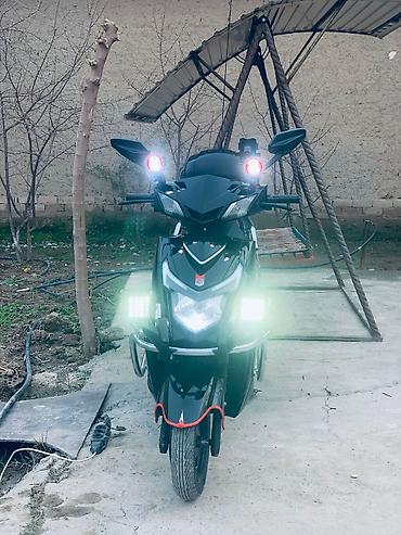 Скутеры: Скутер Skillmax, черный, с богатым комплектом освещения и туристским — 23