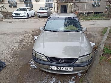 ravon az: Opel Vectra sedan - Kuzov: 4 qapılı sedan, gümüşü rəng - Nömrə kodu — 4