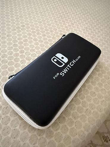nintendo switch oled 4pda: В комплекте ещё идет зарядка и игра Zelda и FIFA 23 и кейс — 2