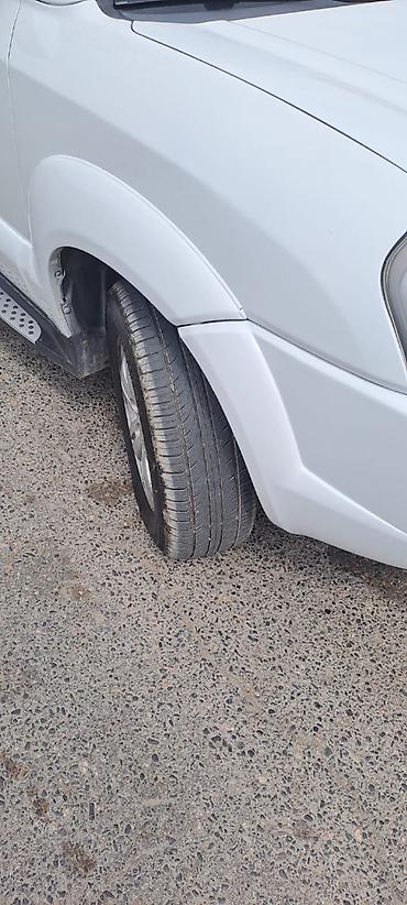 suzuki grand vitara: Hyundai Tucson: 2 l | 2006 il Ofrouder/SUV — 4