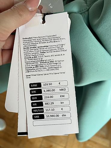 moda piu: Elegantna plisirana suknja u mint zelenoj boji. Asimetričan kroj sa — 4