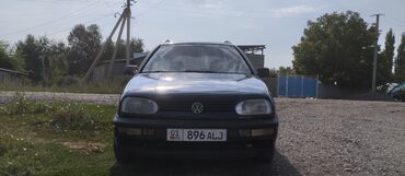 набор ключей для машины: Автомобиль Volkswagen Golf III Variant, представленный в тёмно-синем
