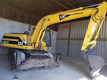 Экскаваторы: Экскаватор, Caterpillar, Колесный — 11