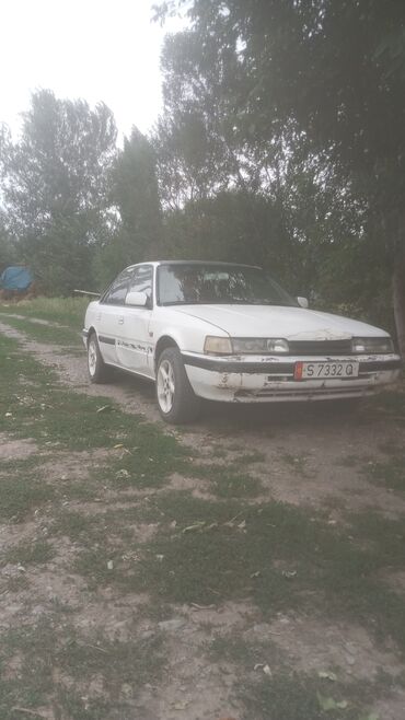 поворотник мазда 626: Mazda 626: 1990 г., 2 л, Механика, Бензин, Седан