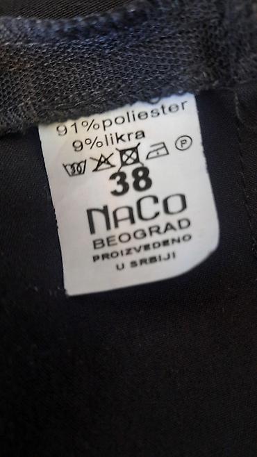 Kombinezoni: Elegantni crni ženski kombinezon bez rukava NACO,br.38 - Kroj: ravne — 4