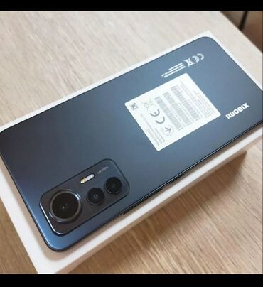 xiaomi mi4s 2 16gb white: Xiaomi Mi 12 Lite, 128 GB, rəng - Qara, 
 Barmaq izi, İki sim kartlı, Face ID
