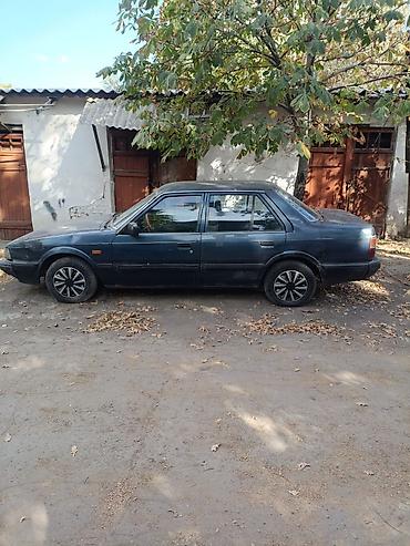 Oldsmobile: Mazda 626: 1987 г. — 4