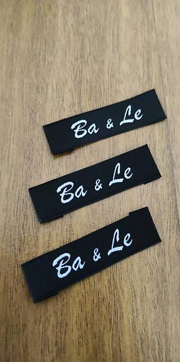 Другие услуги пошива одежды: Жаккардовые этикетки, и основа и логотип вышиваются нитями, главное — 13