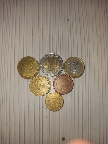 2 dollar neçə manatdır: Evrolar
2,1,0.50,0.20,0.10,0.05