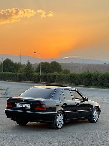 cls 63 amg: Mercedes-Benz C-Class: 2.4 l | 1998 il Sedan — 8