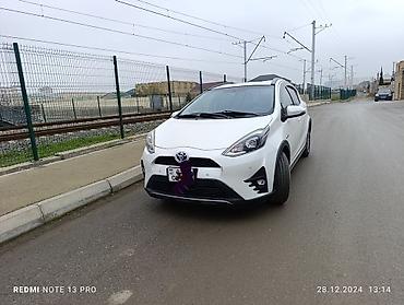 kugoo m4 pro: Corolla .aqua hybrit ideal vezyetde Sumqayıt taksi buraxılışı var — 8
