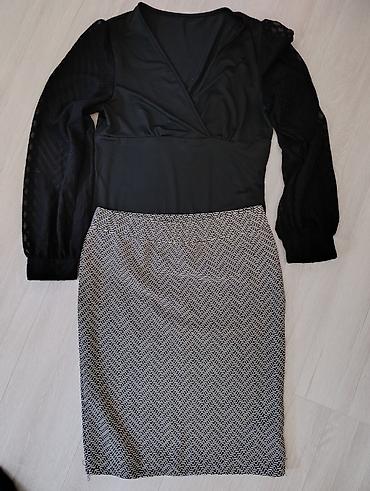 Elegantna kombinacija suknja midi dužine, crno-bela, sa efektom na lalafo.rs Elegantna kombinacija suknja midi dužine, crno-bela, sa efektom