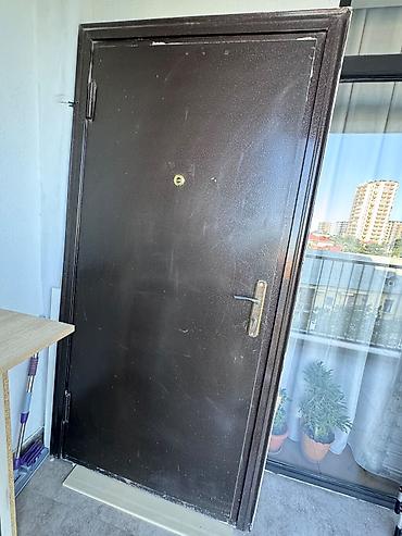 Qapılar və aksessuarlar: Satılır. Novostroykadan çıxan orijinal metal giriş qapısıdır — 1