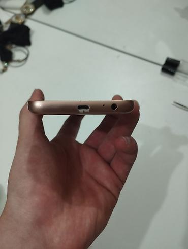 ses ucaldan: Samsung Galaxy J2 Core, 8 GB, rəng - Qızılı — 5