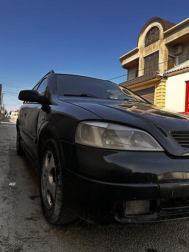 arxa yay: Opel Astra: 1.6 l | 1999 il Universal — 2