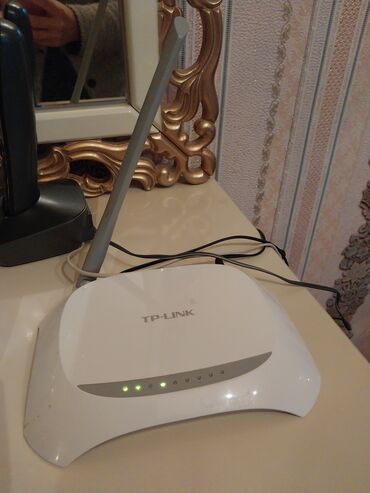 linksys modem: Madem teze alinib.Gencede satilir 15m