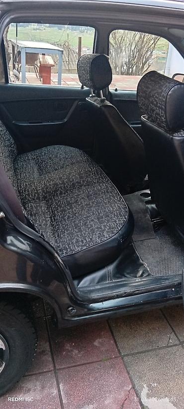 Daewoo: Daewoo Nexia: 1.5 л | 2010 г. Седан — 4