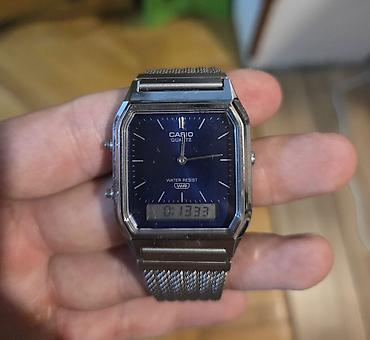 saat satisi: CASIO AQ-230EM-2ADF – hibrid analoq-rəqəmsal qol saatı. Hazırda rəsmi — 2